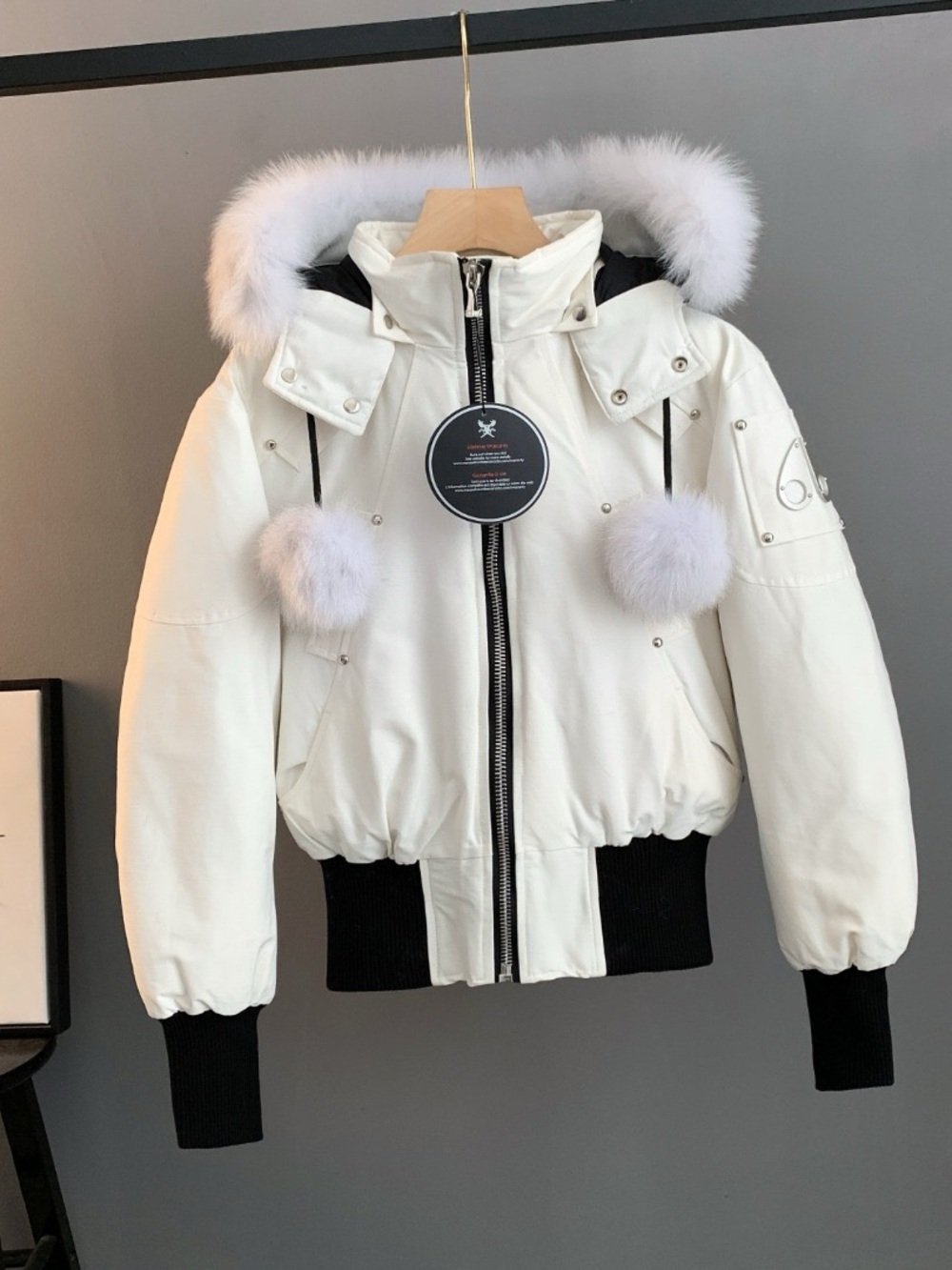 Moose Knuckles White Hooded Ski Bomber with Fur Pom Accents